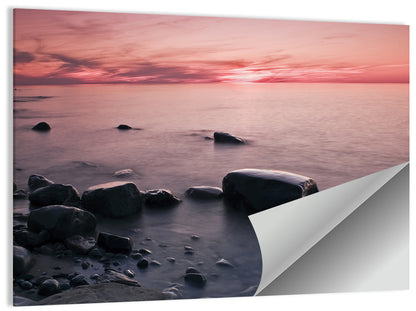 Pink Dusk Lakeshore with Silhouetted Rocks Wall Art