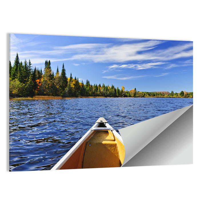 Yellow Canoe Bow on Blue Lake Wall Art as a poster print