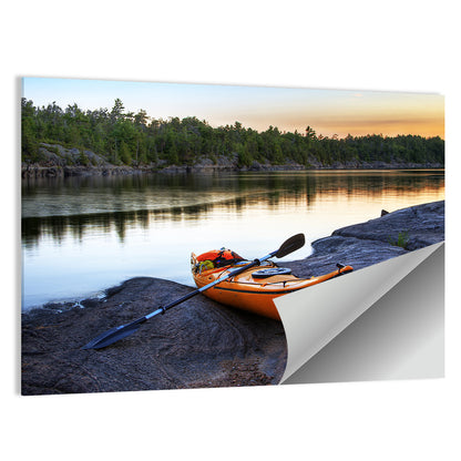 Orange Kayak on Rocky Shore Wall Art