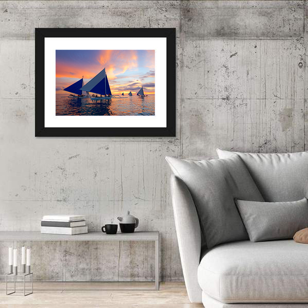 Outrigger Sailboats at Sunset Wall Art in a room, landscape