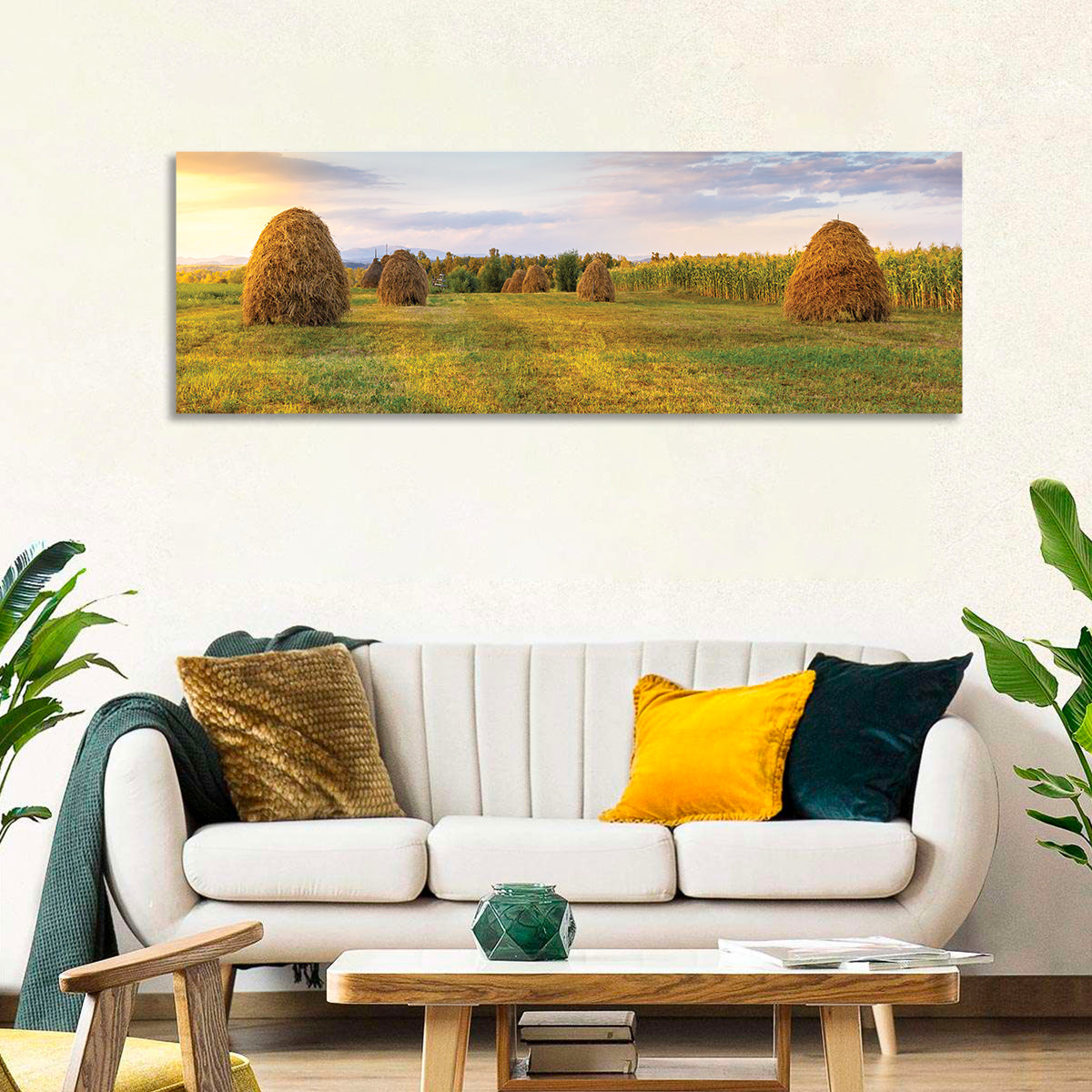 Haystacks at Sunset Fieldscape Wall Art in a room, panoramic