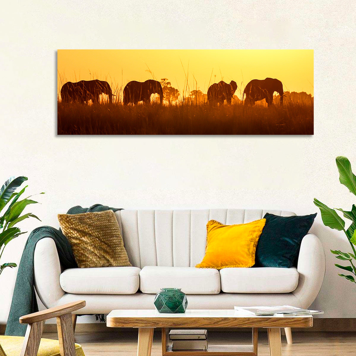 Golden Sunset Elephant Herd Wall Art in a room, panoramic