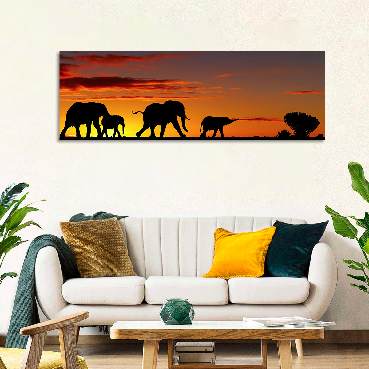 Elephant Herd at Sunset Wall Art in a room, panoramic