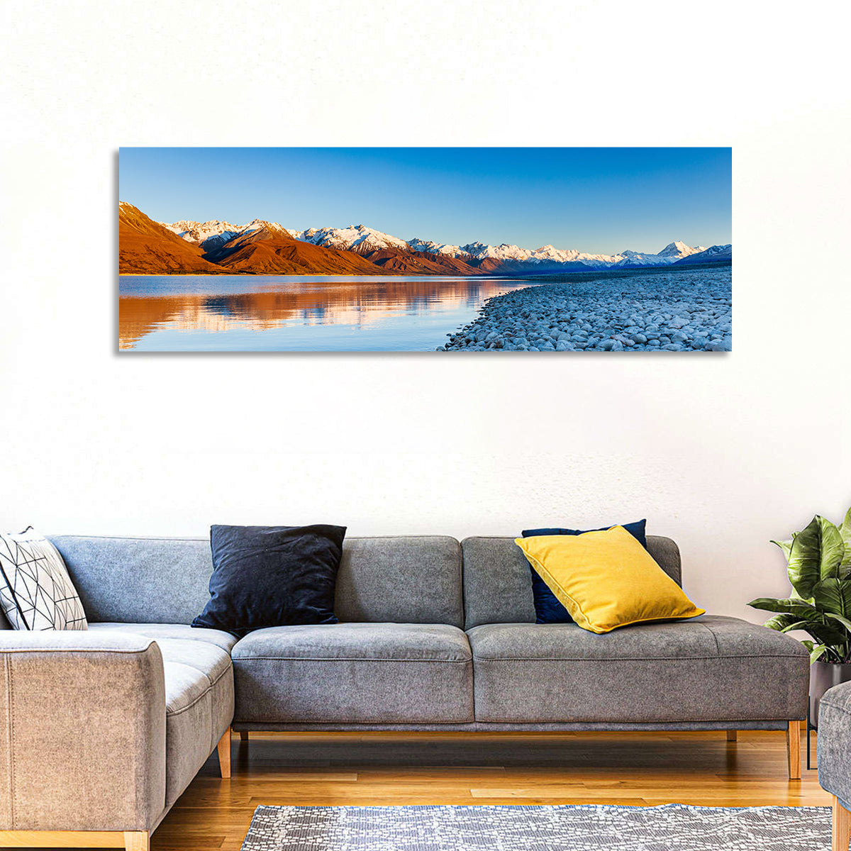 Lake Pukaki Sunset Reflection Wall Art in a room, panoramic