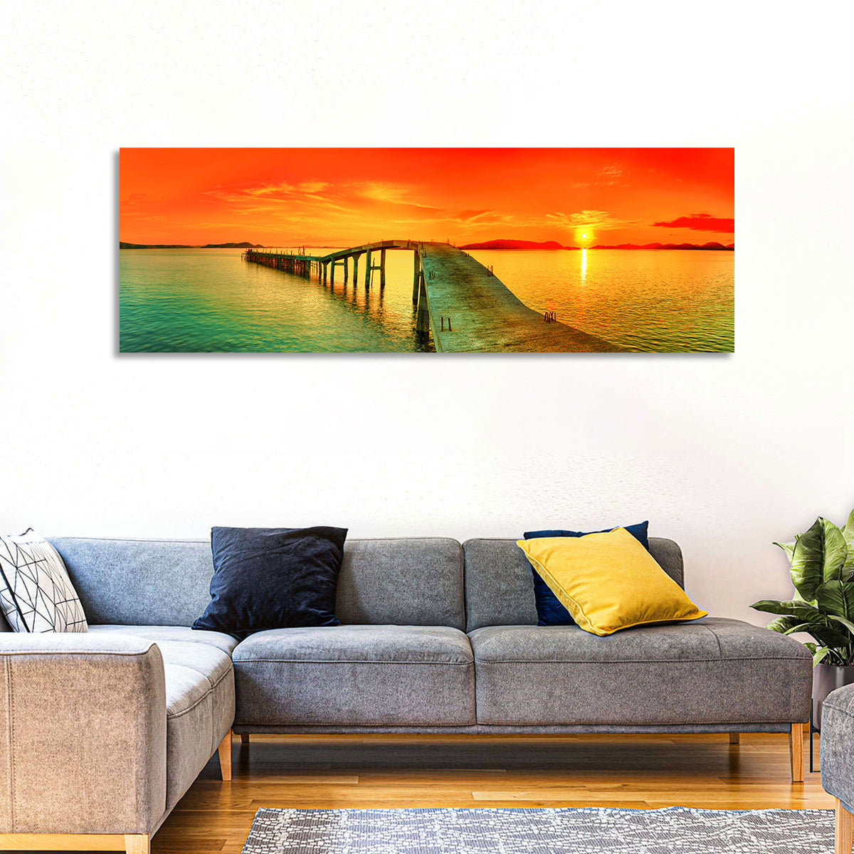 Sea Pier Sunset Wall Art in a room, panoramic