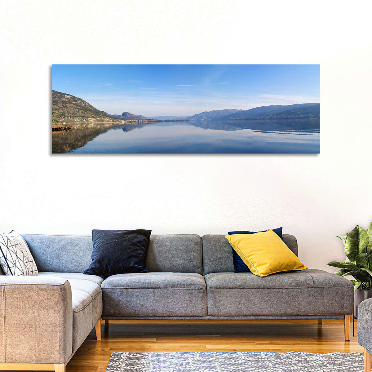 Lake Okanagan Reflection Wall Art in a room, panoramic