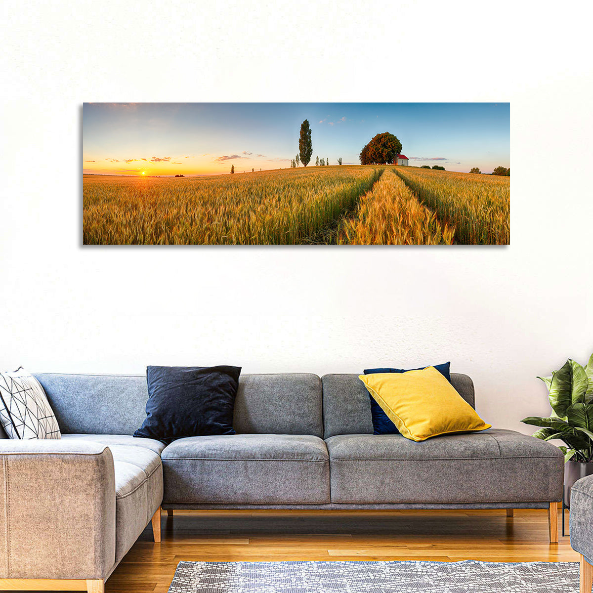 Sunset Wheat Field with Red Roof Cottage Wall Art in a room, panoramic