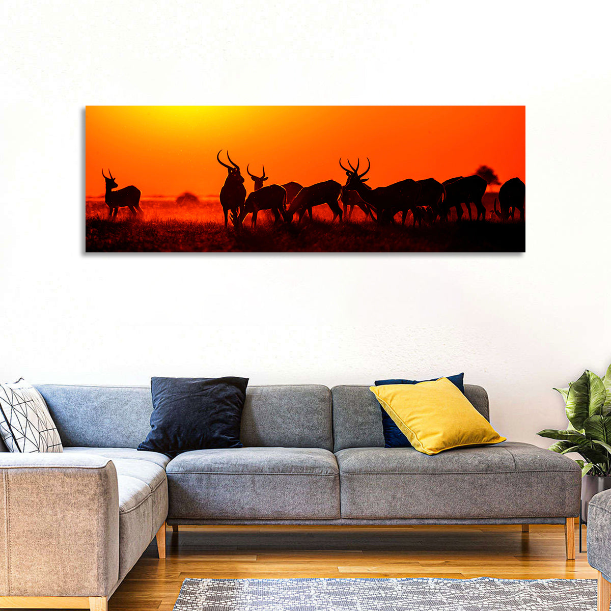 Antelope Herd at Sunset Wall Art in a room, panoramic