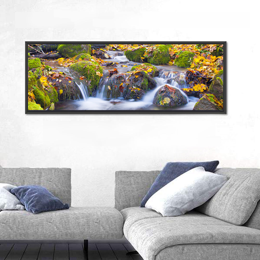 Mossy Autumn Stream Wall Art in a room, panoramic
