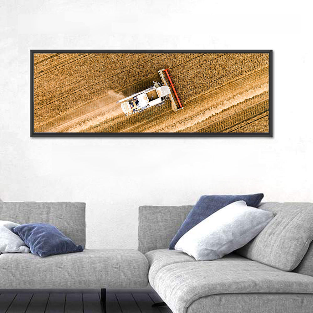 Aerial Combine Over Wheat Field Wall Art in a room, panoramic