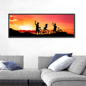 Cycling At Sunset Wall Art