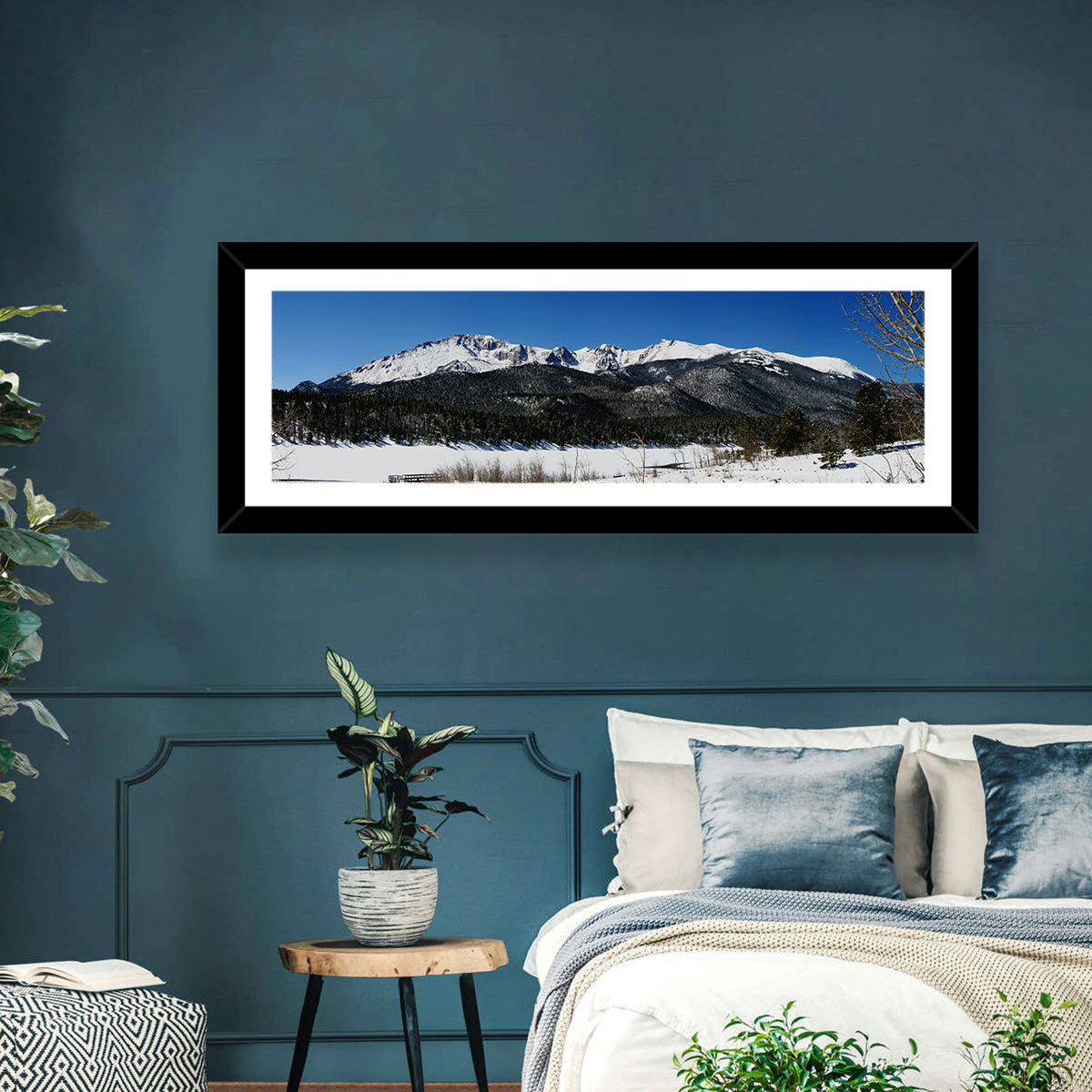 Pikes Peak Winter View Wall Art in a room, panoramic
