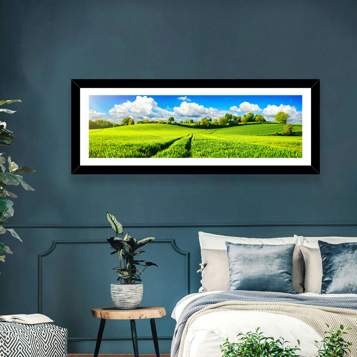 Tractor Tracks Through Green Rolling Hills Wall Art in a room, panoramic