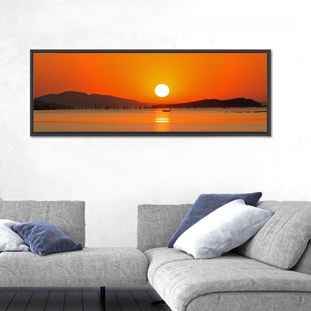 Lake Kariba Sunset Silhouette Wall Art in a room, panoramic