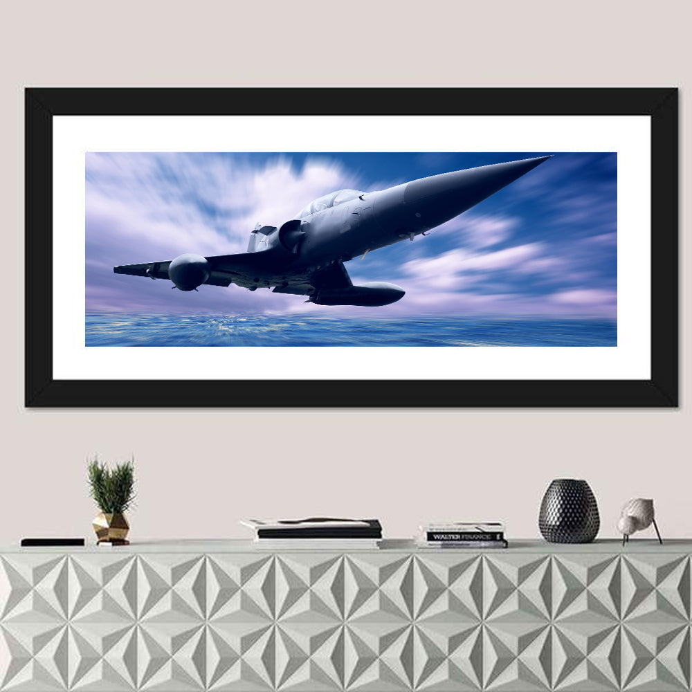 Fighter Jet Ascending Over Clouds Wall Art in a room, panoramic