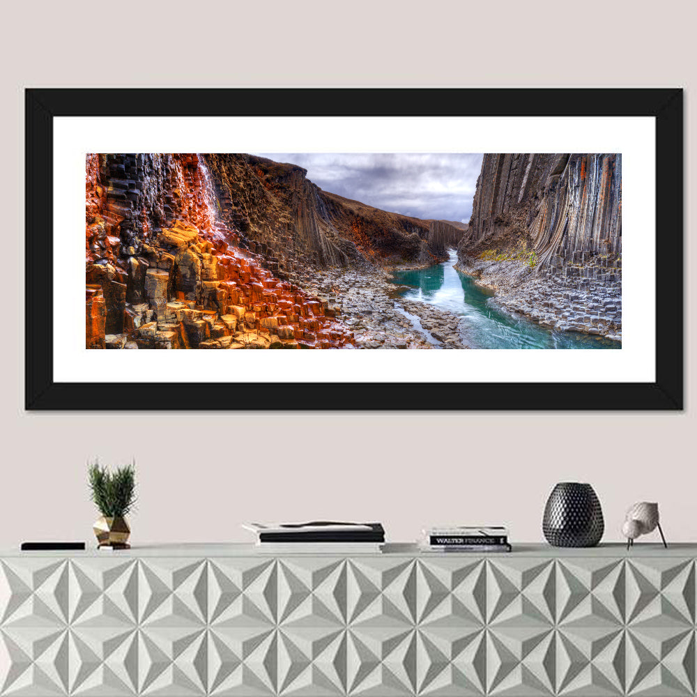 Studlagil Canyon Basalt Columns Wall Art in a room, panoramic