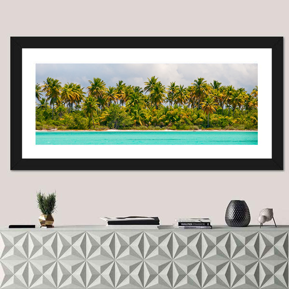 Turquoise Lagoon Palm Tree Beach Wall Art in a room, panoramic
