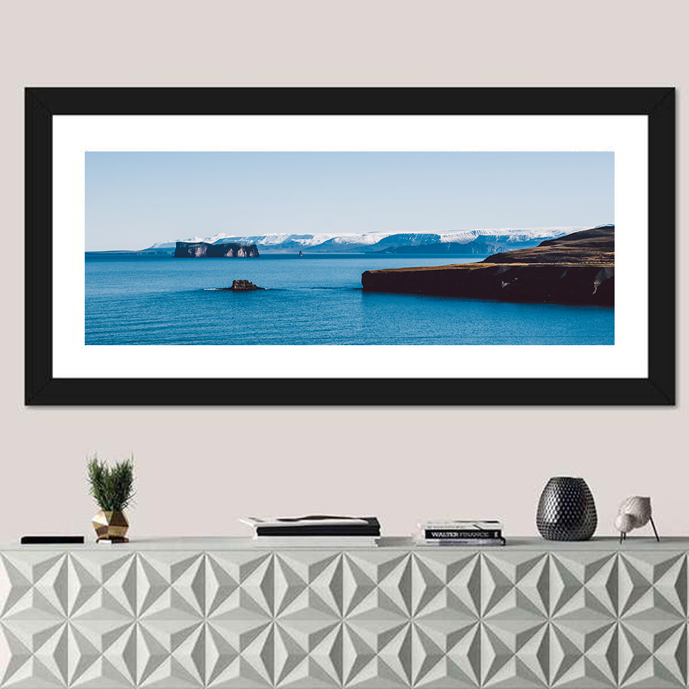 Calm Blue Lake with Coastal Cliffs Wall Art in a room, panoramic