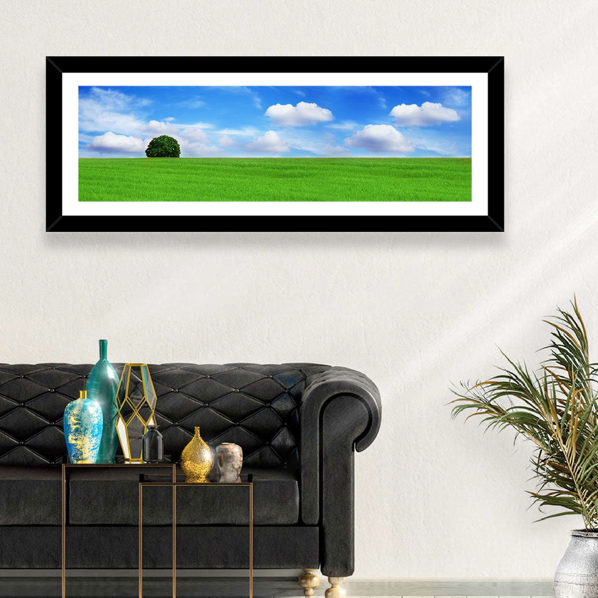 Solitary Tree Over Green Meadow Wall Art in a room, panoramic
