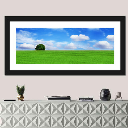 Solitary Tree Over Green Meadow Wall Art