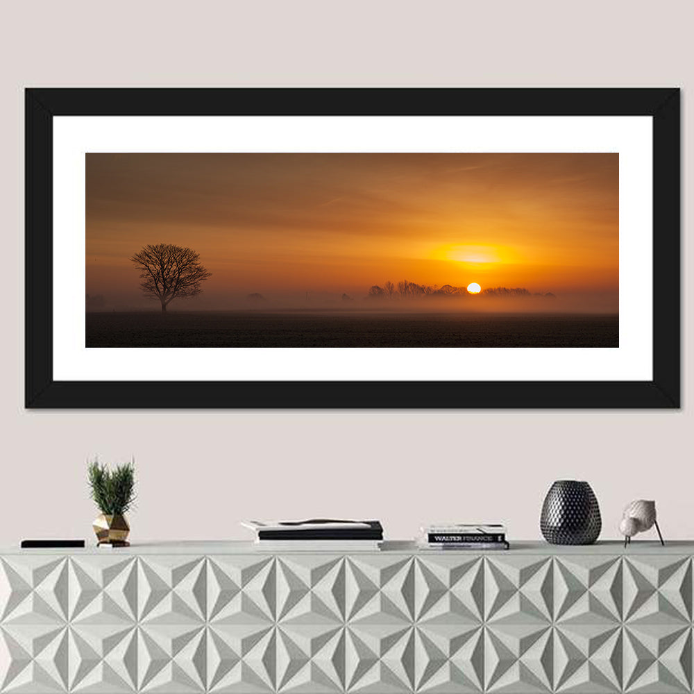 Sunrise Over Foggy Farmland Wall Art in a room, panoramic