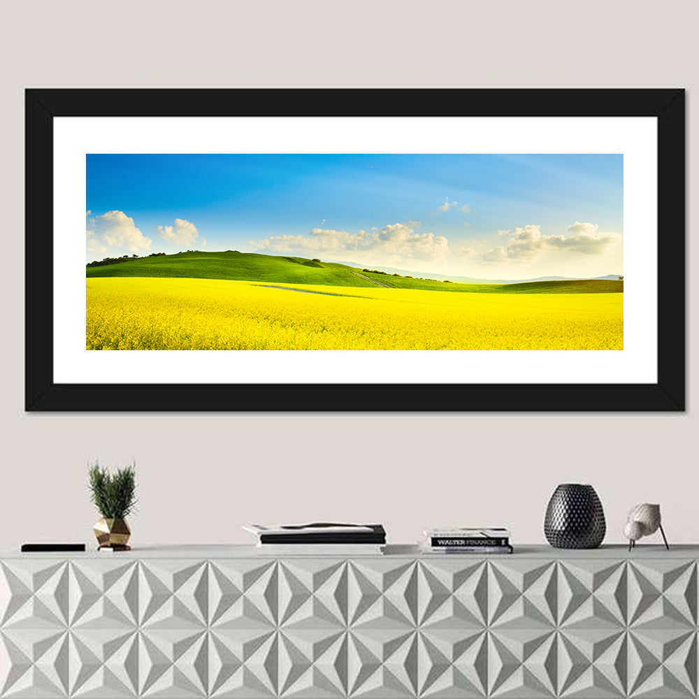 Rapeseed Field and Rolling Hills Under Blue Sky Wall Art
