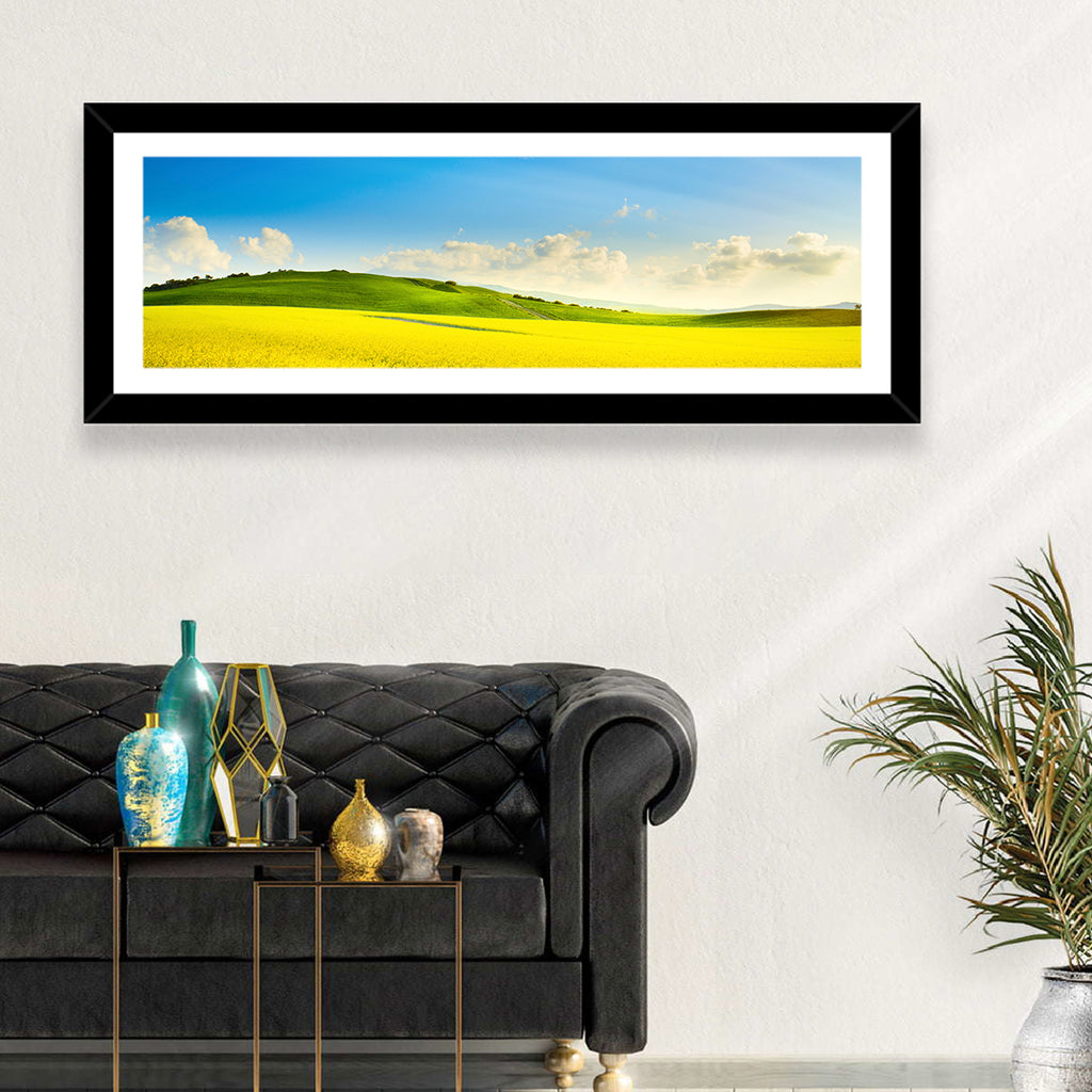 Rapeseed Field and Rolling Hills Under Blue Sky Wall Art