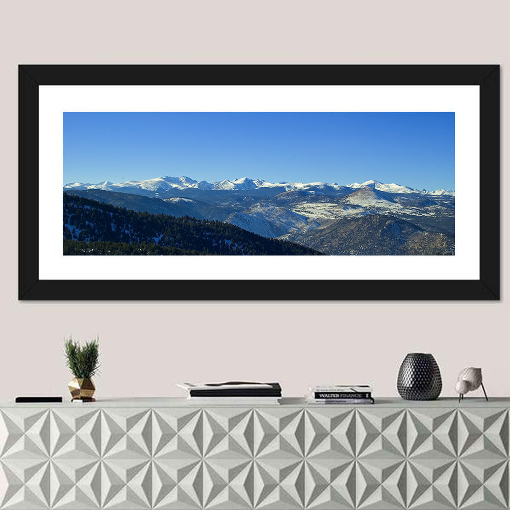Snow-dusted Colorado Rockies Wall Art in a room, panoramic