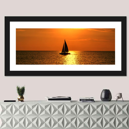 Sailboat Silhouette at Golden Sunset Wall Art