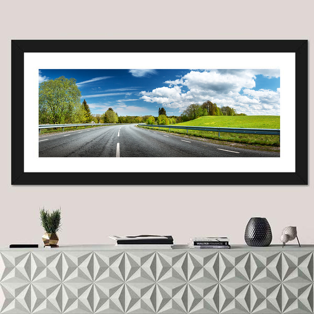 Sunlit Asphalt Road Wall Art in a room, panoramic