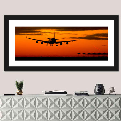 Airplane Landing at Sunset Wall Art