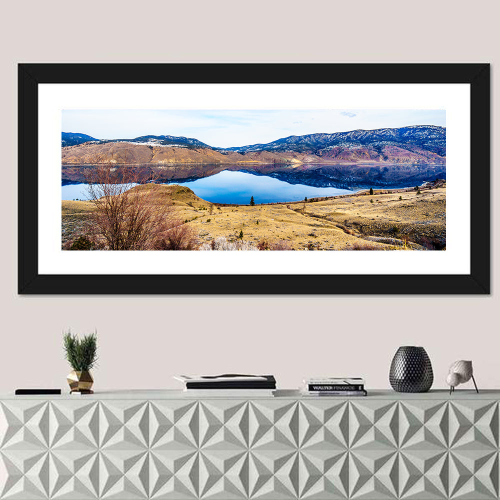 Kamloops Lake Winter Reflection Wall Art in a room, panoramic