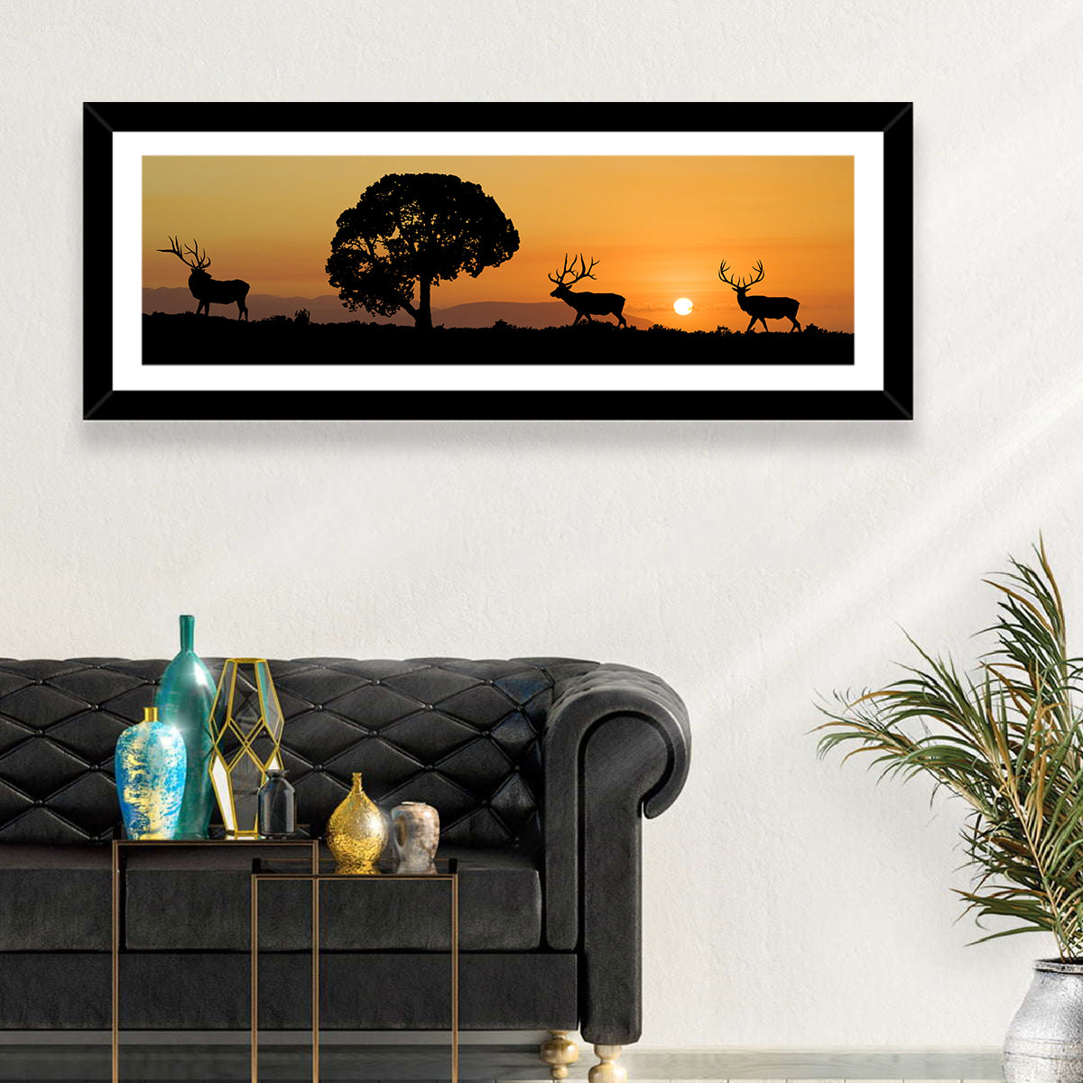 Bull Elk Sunset Silhouette Wall Art in a room, panoramic