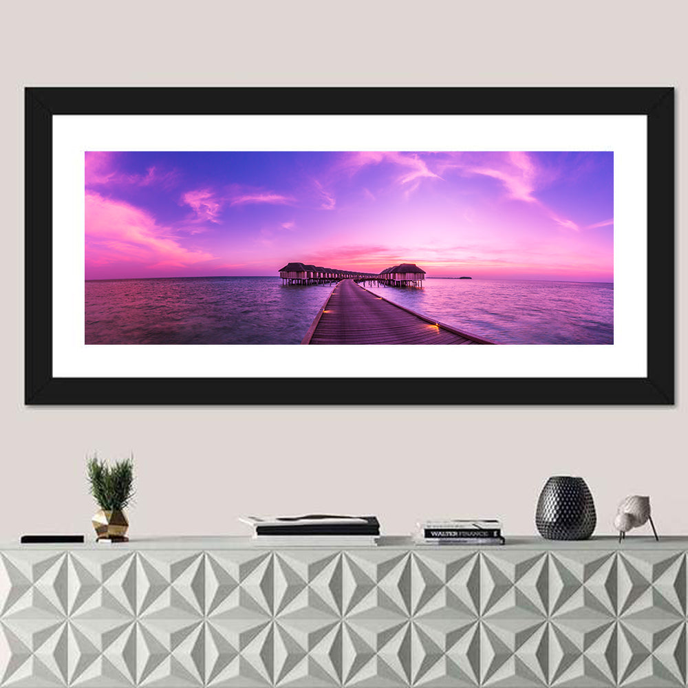 Sunset Pier Overwater Bungalows Wall Art in a room, panoramic