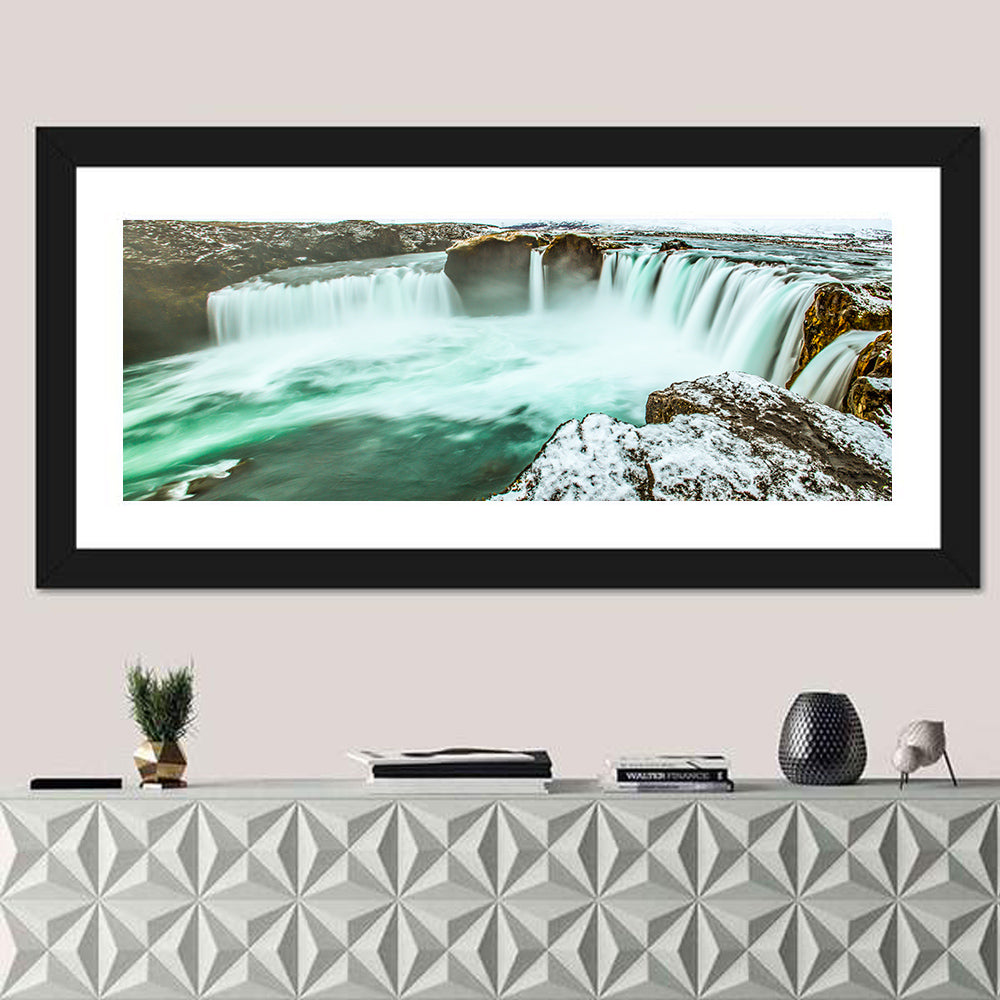 Goðafoss Winter Waterfall Wall Art in a room, panoramic
