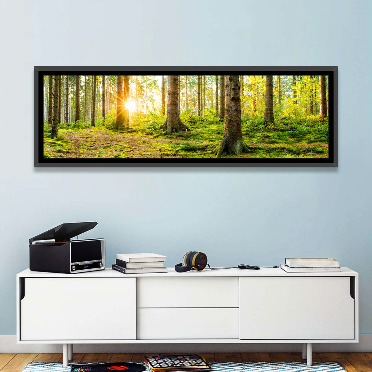 Sunburst Over Mossy Forest Wall Art in a room, panoramic