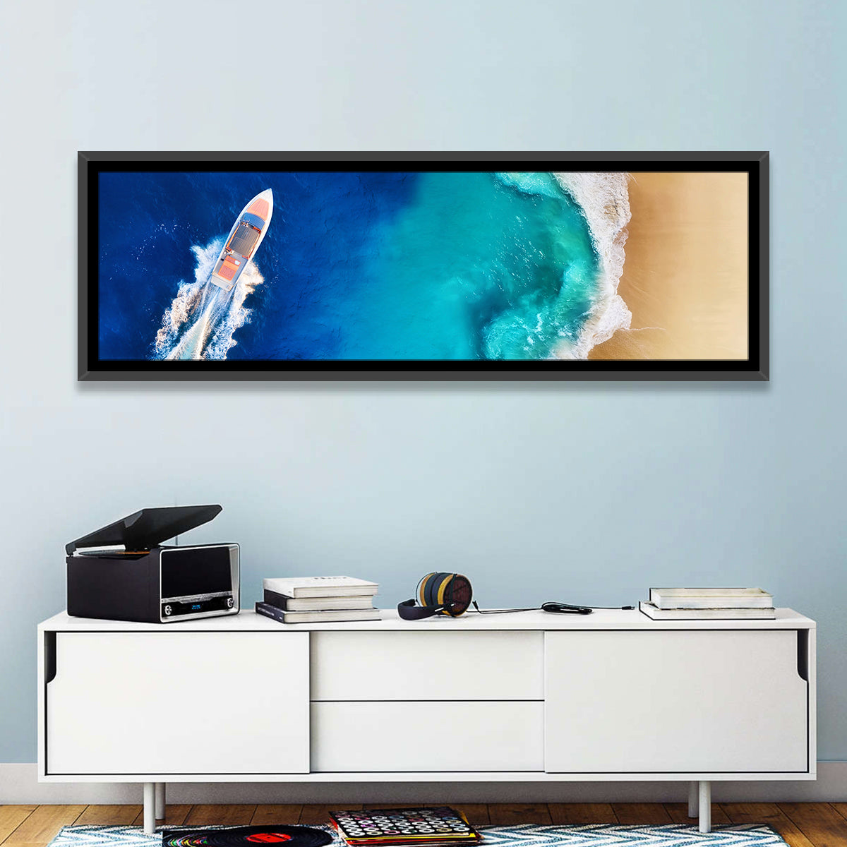 Speed Boat Over Turquoise Beach Wall Art in a room, panoramic