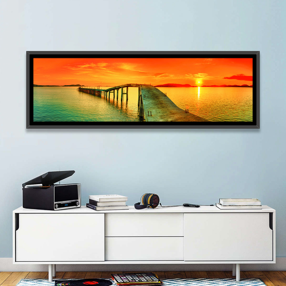 Sea Pier Sunset Wall Art in a room, panoramic