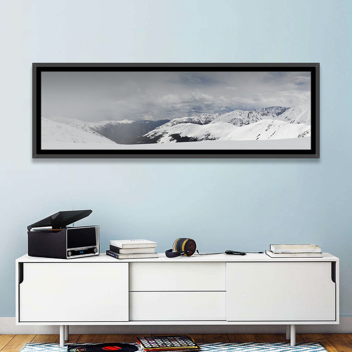 Snowy Colorado Mountains Wall Art in a room, panoramic