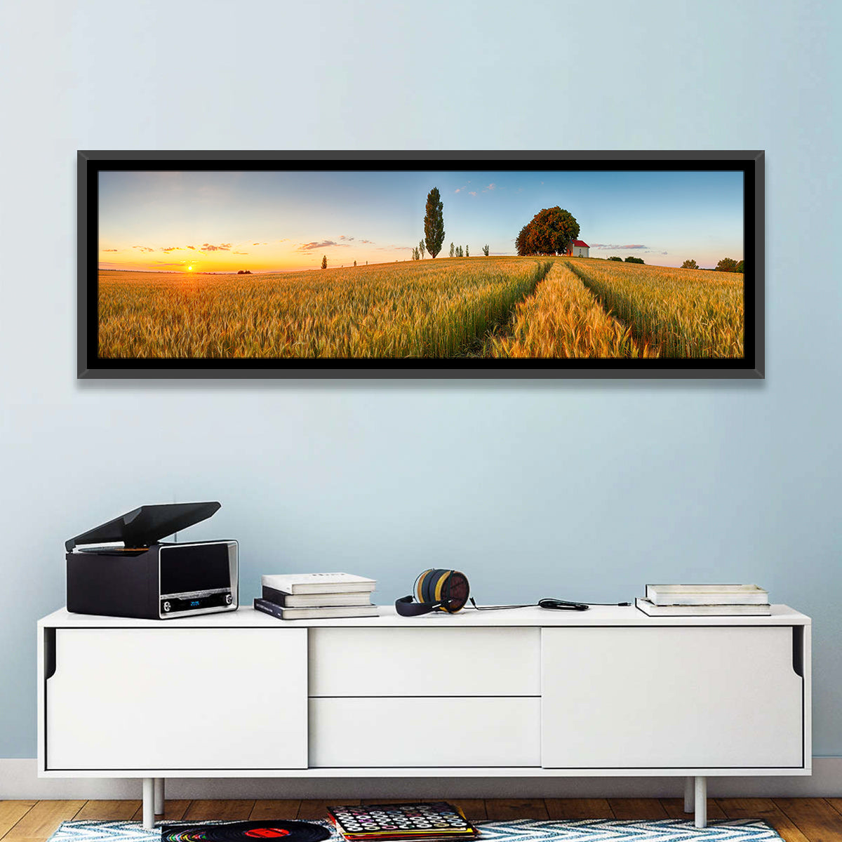 Sunset Wheat Field with Red Roof Cottage Wall Art in a room, panoramic
