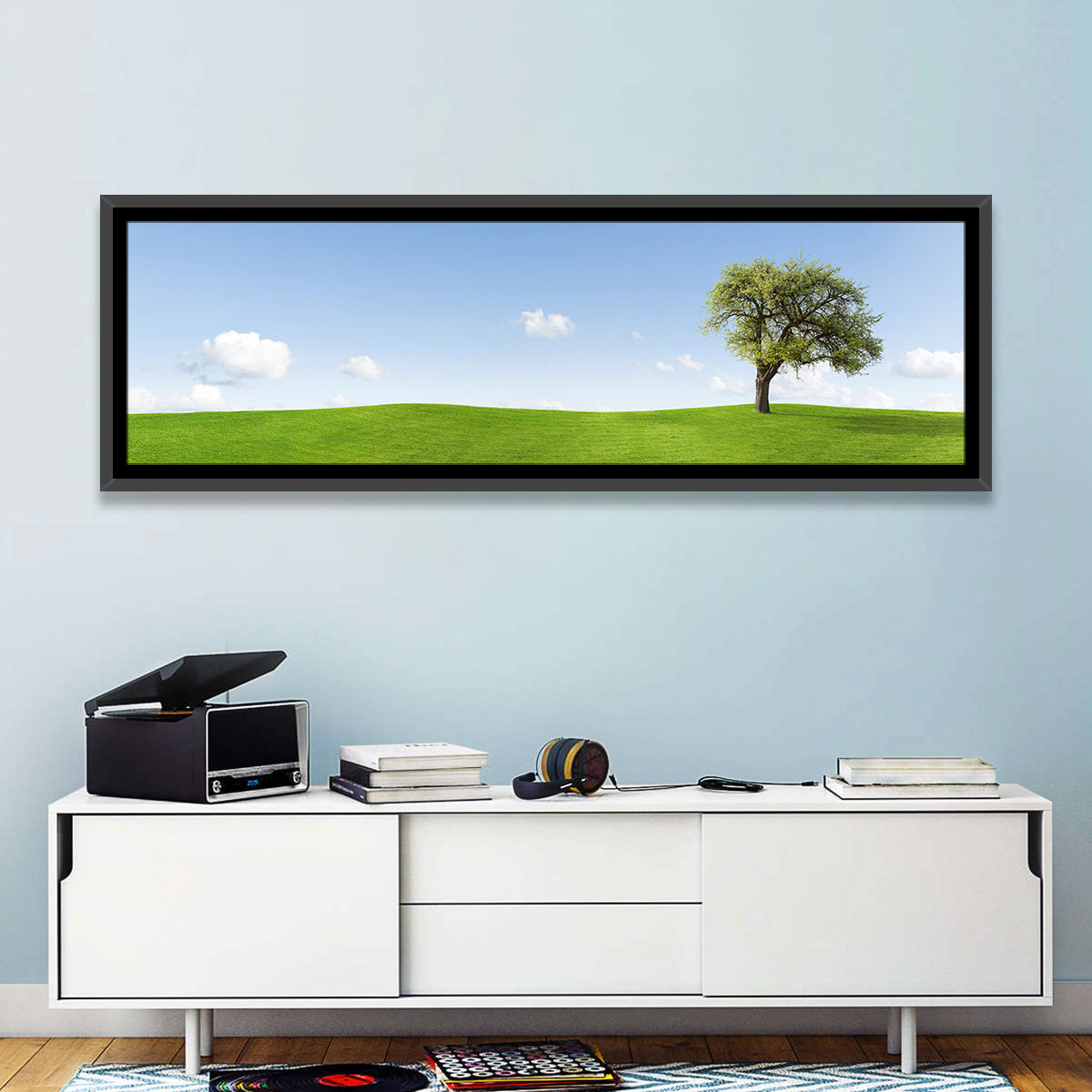 Lone Tree on Green Hill Wall Art in a room, panoramic