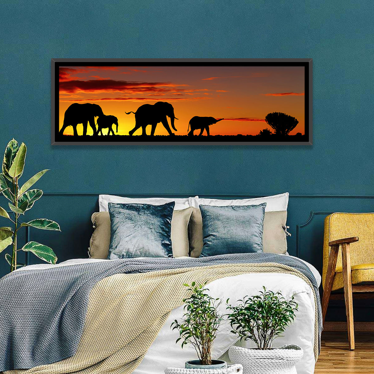 Elephant Herd at Sunset Wall Art in a room, panoramic