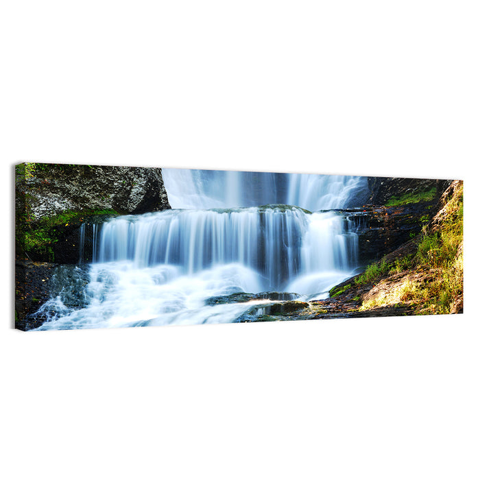 White Waterfall Over Mossy Rocks Wall Art as a canvas print