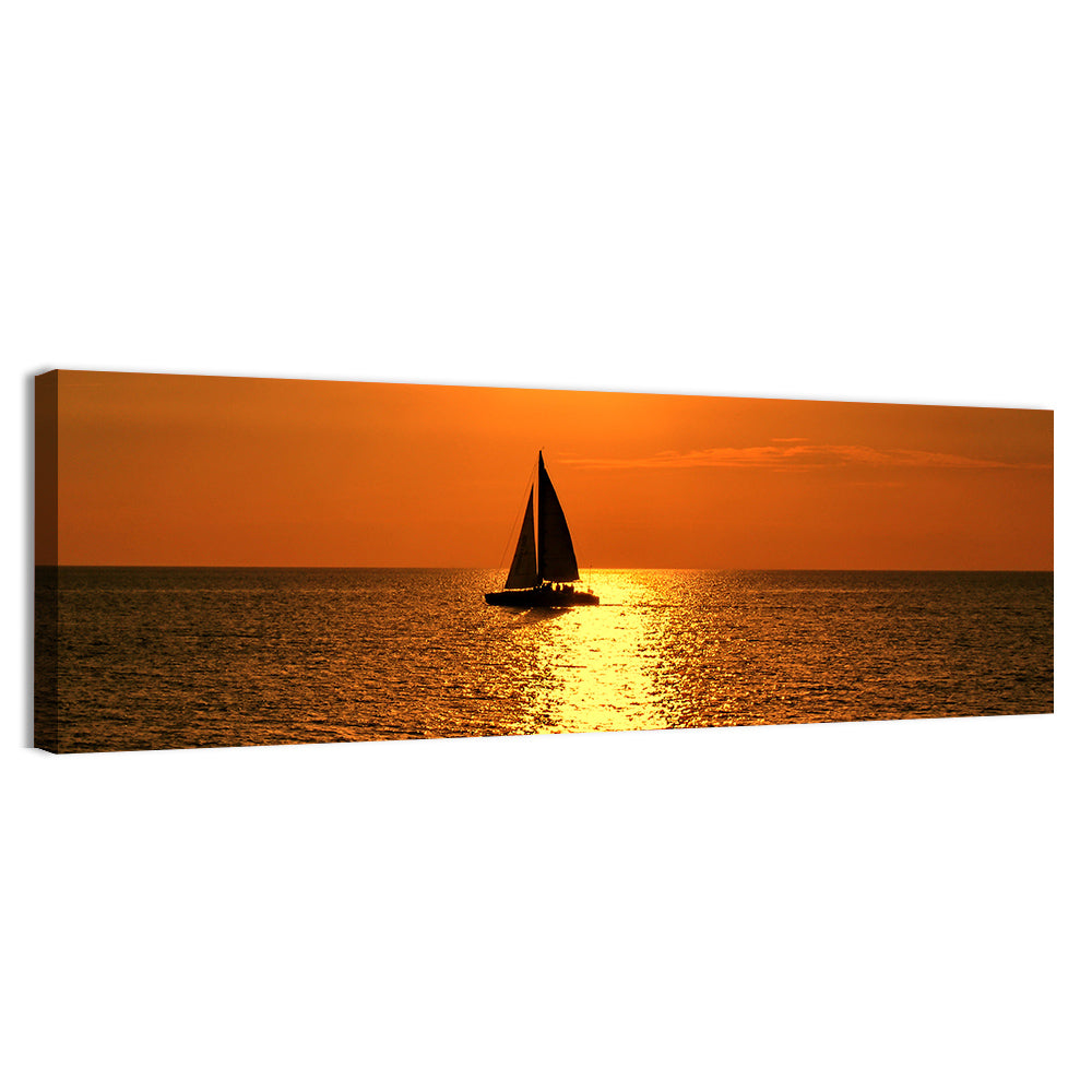 Sailboat Silhouette at Golden Sunset Wall Art