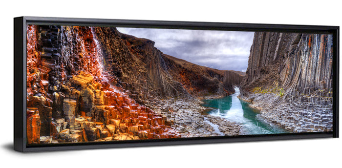 Studlagil Canyon Basalt Columns Wall Art as a framed canvas