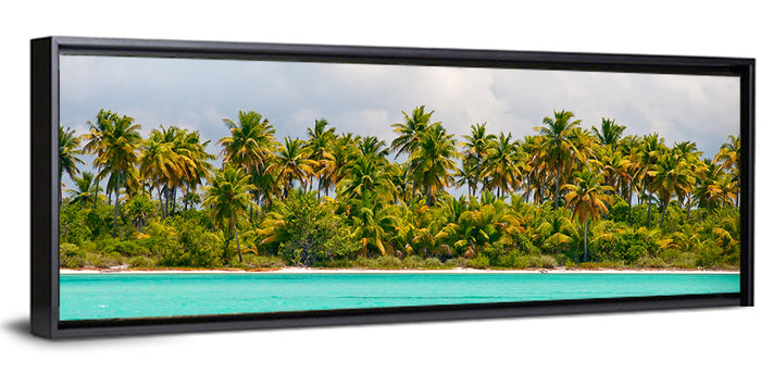 Turquoise Lagoon Palm Tree Beach Wall Art as a framed canvas