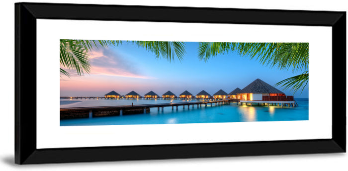 Overwater Bungalows at Twilight Wall Art as a framed print