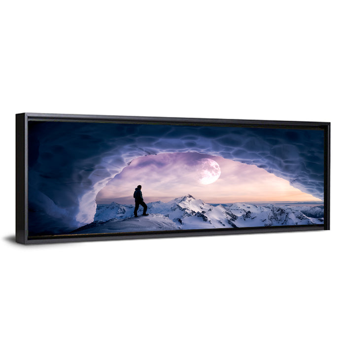 Moonlit Ice Cave Hiker Wall Art as a framed canvas