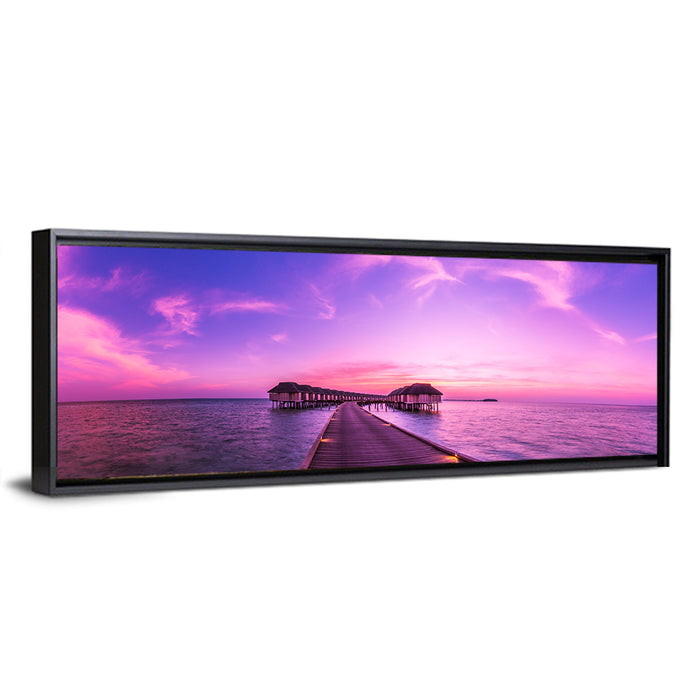 Sunset Pier Overwater Bungalows Wall Art as a framed canvas