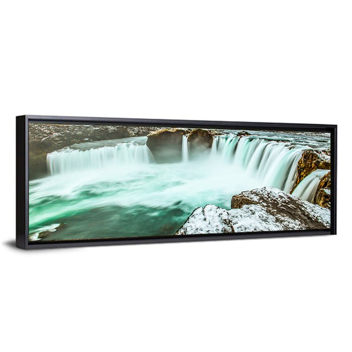 Goðafoss Winter Waterfall Wall Art as a framed canvas